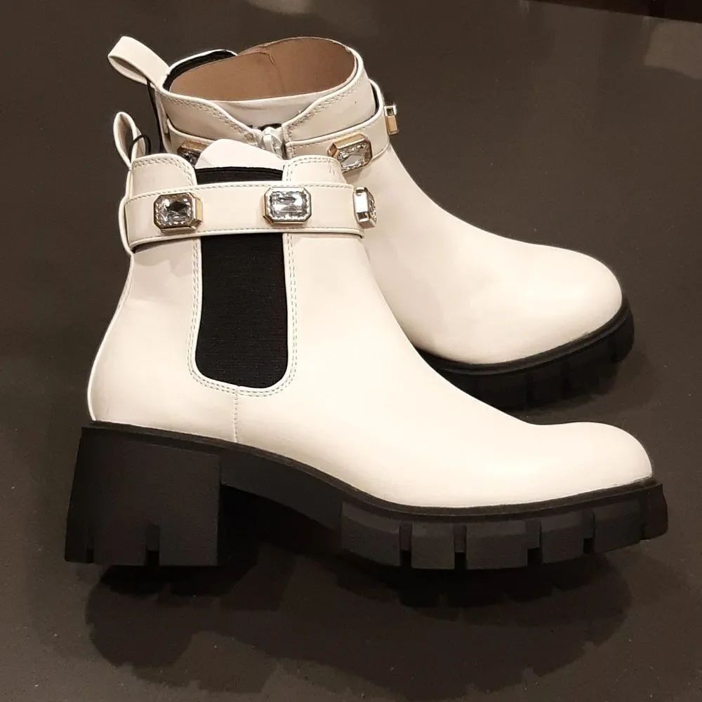 Steve Madden White Ankle Boots with Black Sole